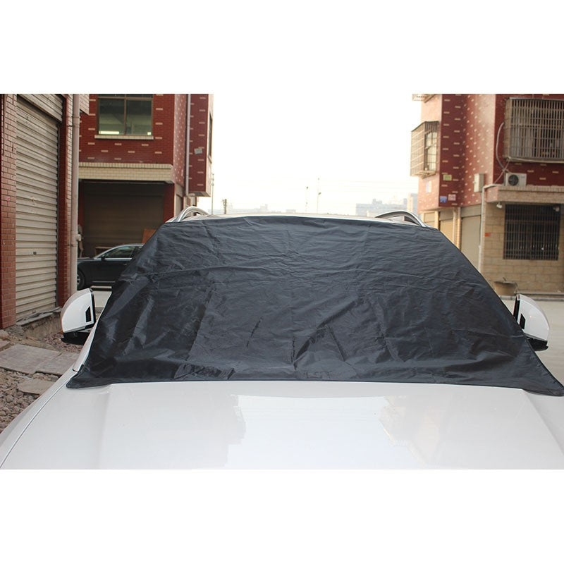 Magnetic Windshield Cover on car windshield providing protection from snow, ice, and sunlight.